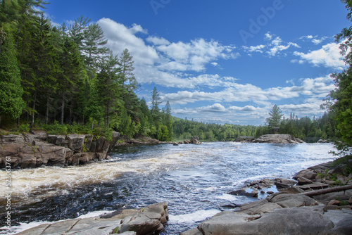 Waterfalls on a beautiful wild river in Quebec in Canada