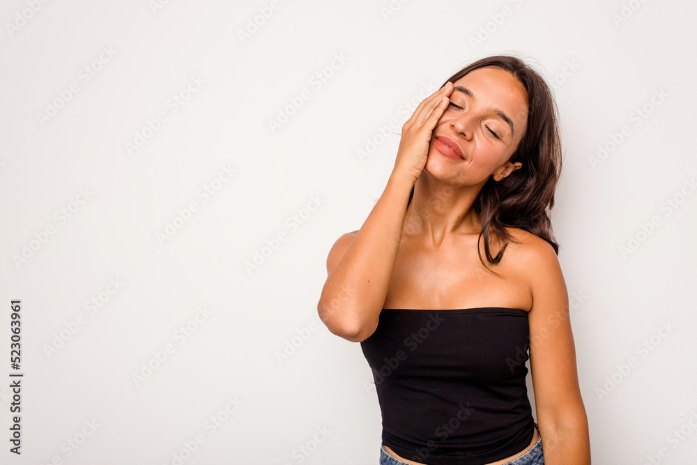 Young hispanic woman isolated on white background laughing happy, carefree, natural emotion. Young hispanic woman isolated on white background laughing happy, carefree, natural emotion.