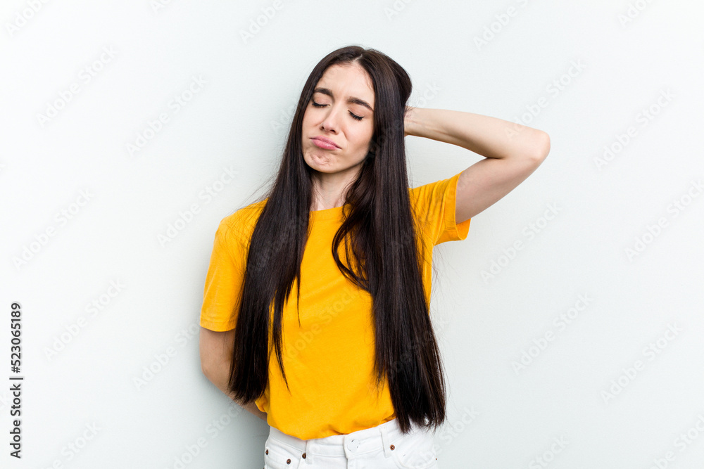 Young caucasian woman isolated on white background tired and very sleepy keeping hand on head. Young caucasian woman isolated on white background tired and very sleepy keeping hand on head.