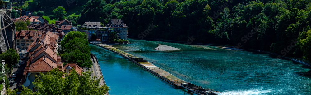Floodgates or flood locks on the river Aare in Bern, Switzerland to regulate the water flow. Floodgates or flood locks on the river Aare in Bern, Switzerland to regulate the water flow.