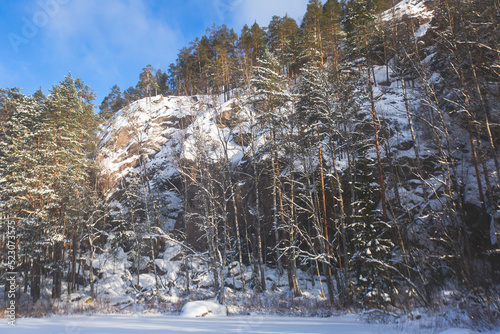 Repovesi National Park, aerial winter view, landscape view of a finnish park, southern Finland, Kouvola and Mantyharju, region of Kymenlaakso, with a group of tourists and wooden infrastructure photo