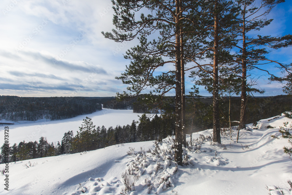 Repovesi National Park, aerial winter view, landscape view of a finnish park, southern Finland, Kouvola and Mantyharju, region of Kymenlaakso, with a group of tourists and wooden infrastructure Repovesi National Park, aerial winter view, landscape view of a finnish park, southern Finland, Kouvola and Mantyharju, region of Kymenlaakso, with a group of tourists and wooden infrastructure