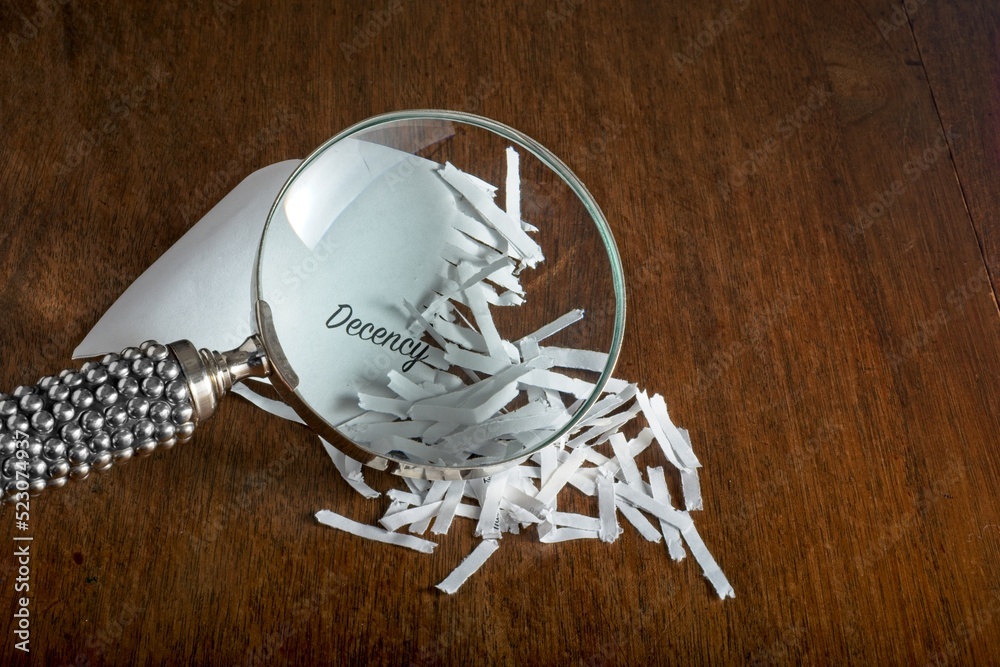 Shred of Decency concept divulging the word ‘Decency’ recovered from a ...
