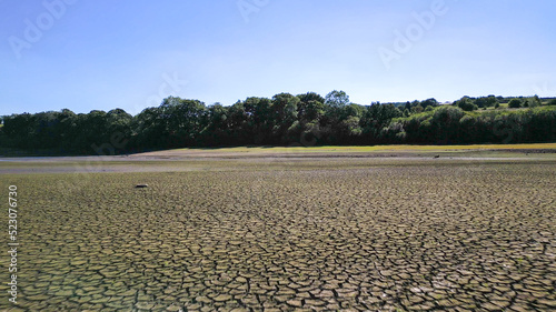 Quadro em tela Drone footage of aerial view over Lindley Wood Reservoir, North Yorkshire, during drought in summer 2022 heatwave