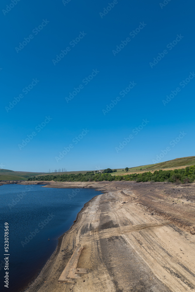 Baitings Reservoir near Ripponden, West Yorkshire, part of Yorkshire Water's series of reservoirs. Drought conditions across England causing depleted water levels.