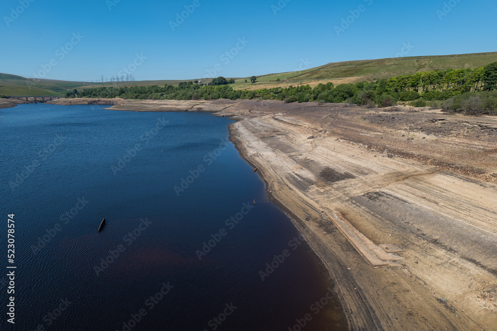 Baitings Reservoir near Ripponden, West Yorkshire, part of Yorkshire Water's series of reservoirs. Drought conditions across England causing depleted water levels.