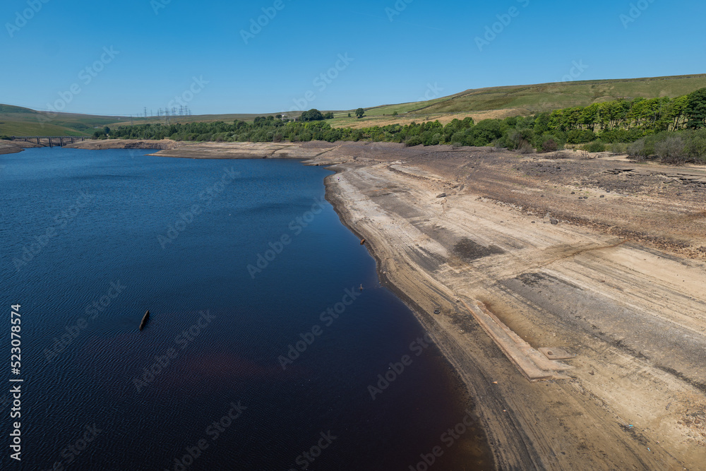 Baitings Reservoir near Ripponden, West Yorkshire, part of Yorkshire Water's series of reservoirs. Drought conditions across England causing depleted water levels. Baitings Reservoir near Ripponden, West Yorkshire, part of Yorkshire Water's series of reservoirs. Drought conditions across England causing depleted water levels.