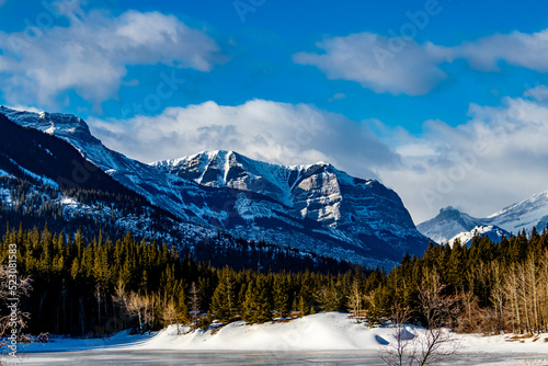 The Horton Range over an Ice covered Middle Lake, Bow Valley Provincial Park, Alberta, Canada