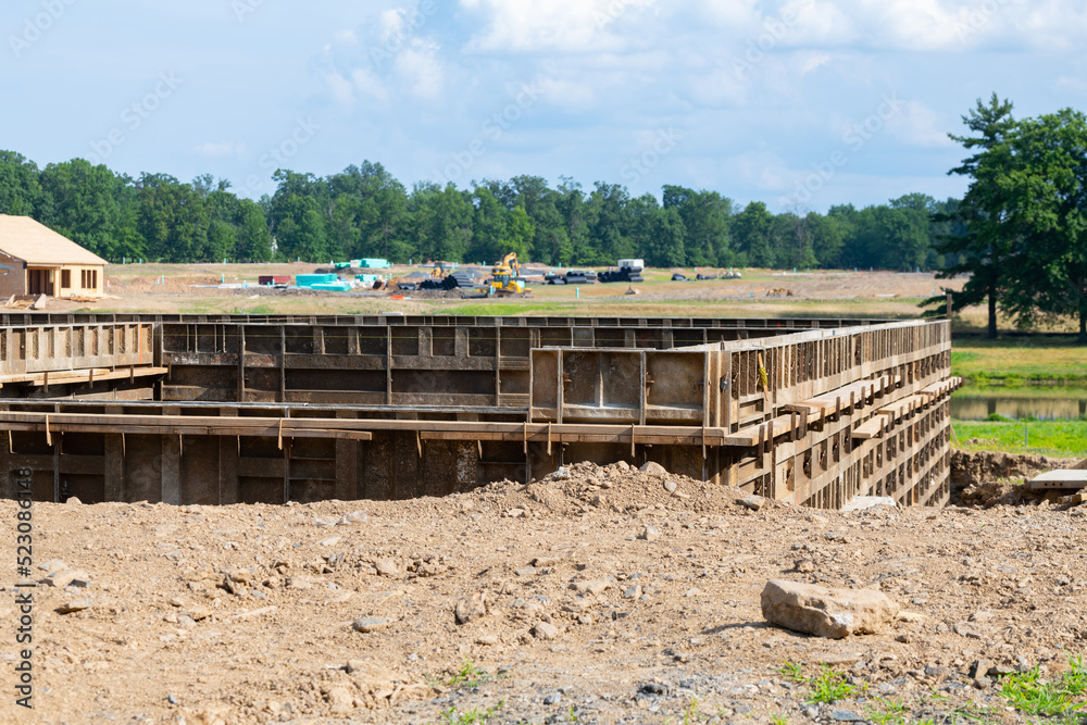 concrete foundation with reinforcement and metal slab construction site, process of house building formwork for foundation new