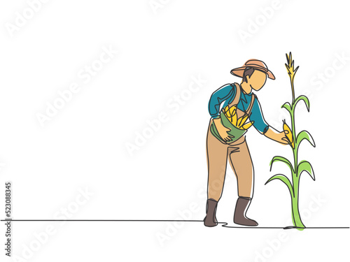 Single one line drawing of young male farmer picking the corn on the tree. Professional farmer. Farming challenge minimalist concept. Modern continuous line draw design graphic vector illustration.