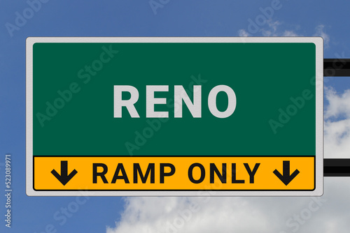 Reno logo. Reno lettering on a road sign. Signpost at entrance to Reno, USA. Green pointer in American style. Road sign in the United States of America. Sky in background
