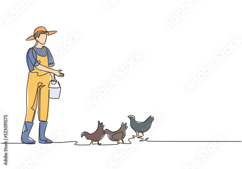 Continuous one line drawing young male farmer is feeding the chickens with chicken feed. Successful farming activities minimalist concept. Single line draw design vector graphic illustration.