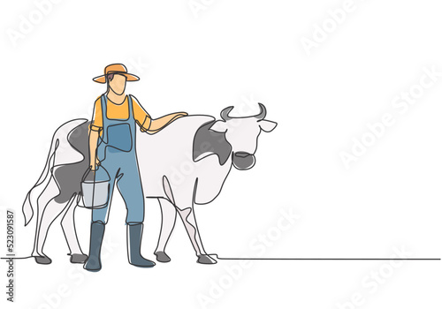Continuous one line drawing young male farmer rubbing the cow while carrying a bucket of water. Successful farming activities minimalist concept. Single line draw design vector graphic illustration.