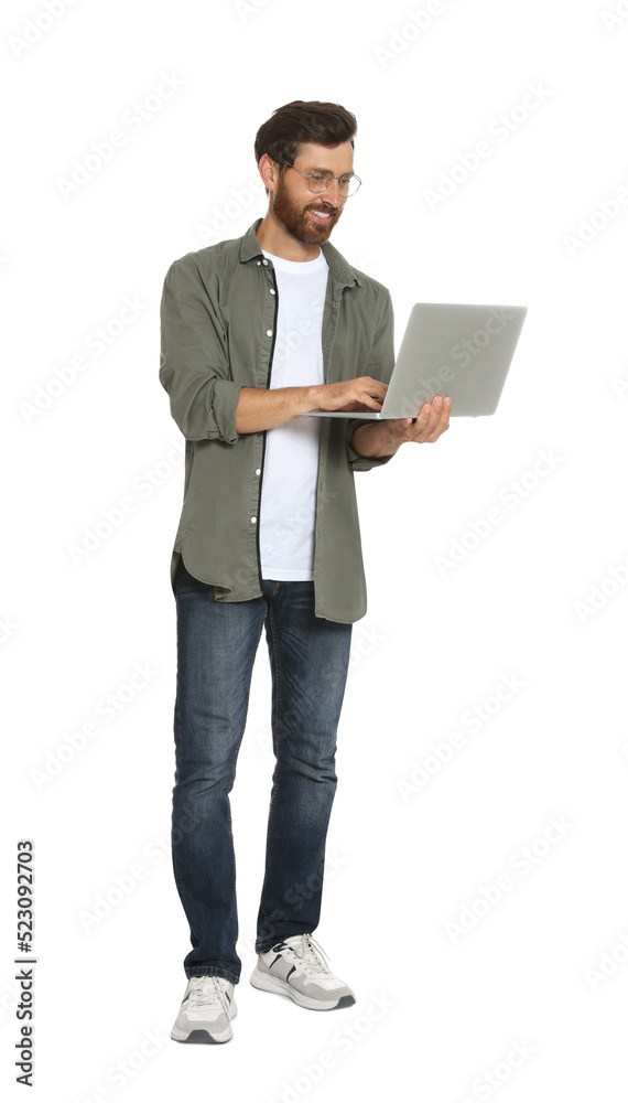 Handsome man holding laptop on white background Handsome man holding laptop on white background