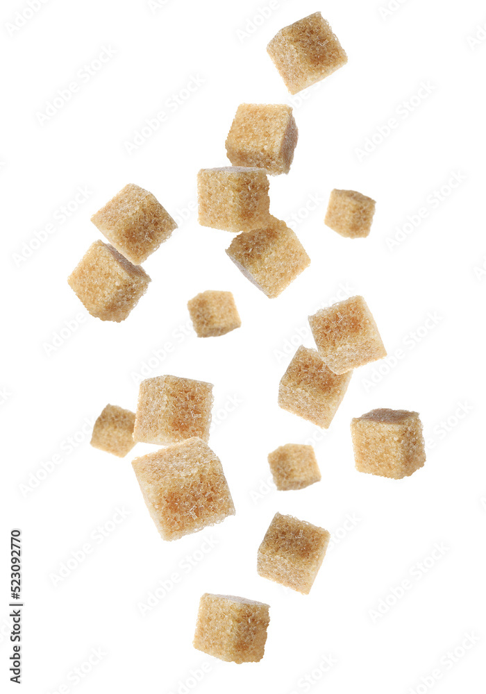 Flying cubes of brown sugar on white background Flying cubes of brown sugar on white background