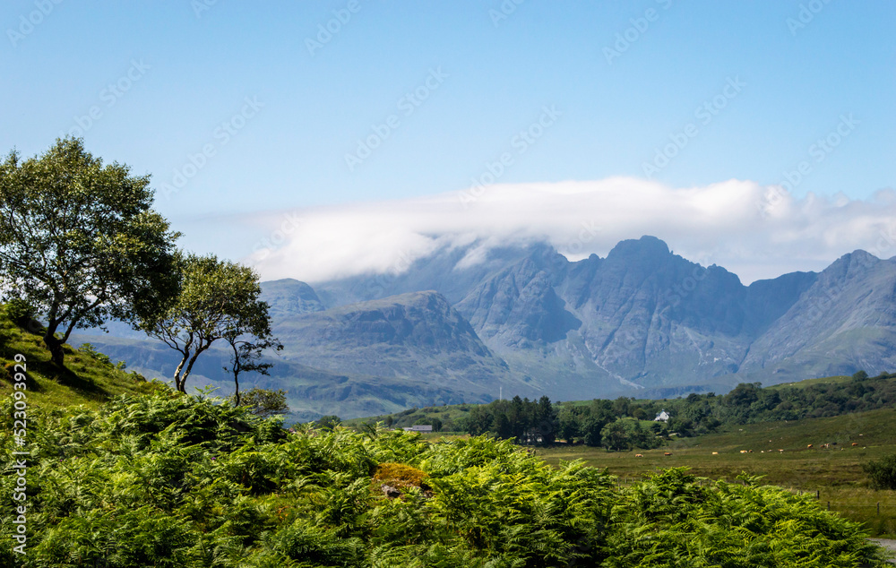 Beautiful landscape of Scotland Isle of Skye with mountain Blà Bheinn at background in a sunny day.