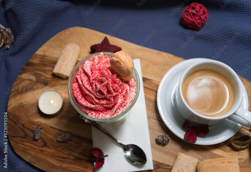 Dessert of whipped cream, savoyardi cookies and raspberry sprinkles with a cup of hot espresso coffee without milk Dessert of whipped cream, savoyardi cookies and raspberry sprinkles with a cup of hot espresso coffee without milk