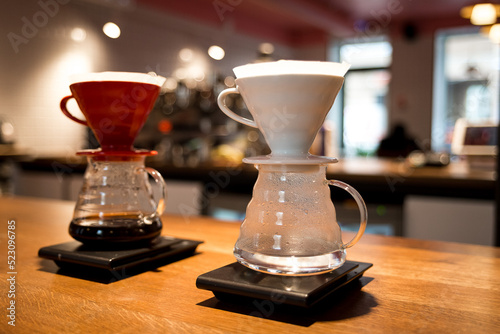 brewing coffee alternative method, two coffee funnels stand on scales and brew hot drinks, coffee filter