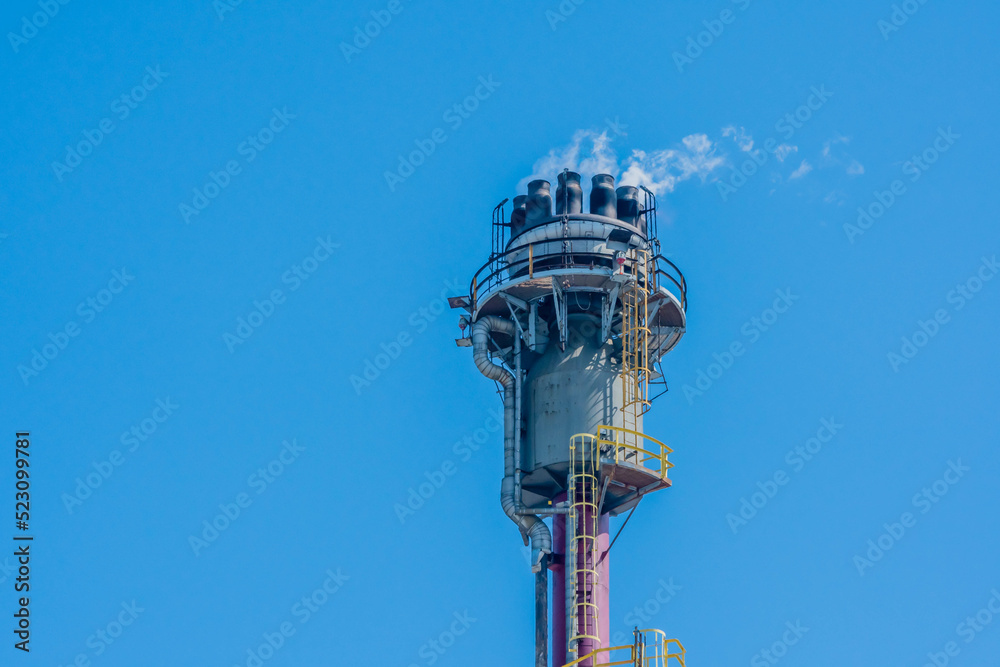 Gas burning at gas pressure release tower natural gas production plant.