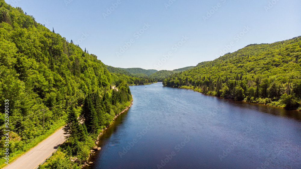 Aerial photo of a river flowing through a national park Aerial photo of a river flowing through a national park