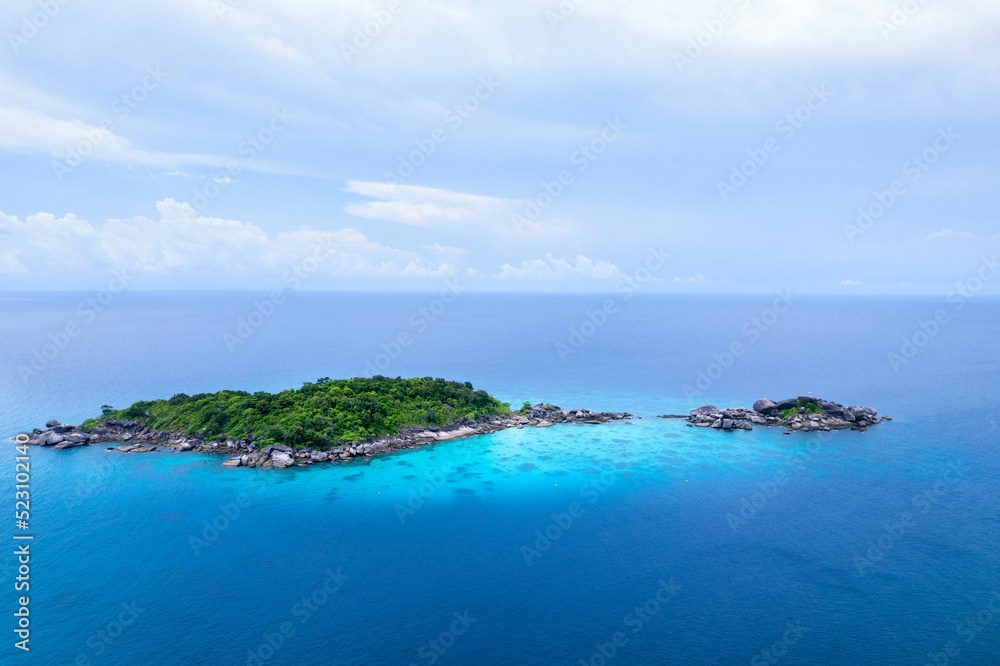 aerial view of the Similan Islands, the Andaman Sea, with natural blue waters, tropical seas, impressive views of the island's beauty. The island is shaped like a heart.