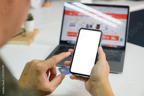 Man using smart phone and holding credit card with online shopping.Online payment concept. payment confirmation