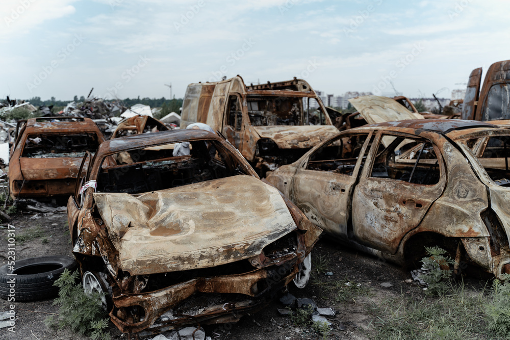 15.07.2022,Bucha Stacked vehicles. War in Ukraine, Bucha Irpin 15.07.2022,Bucha Stacked vehicles. War in Ukraine, Bucha Irpin