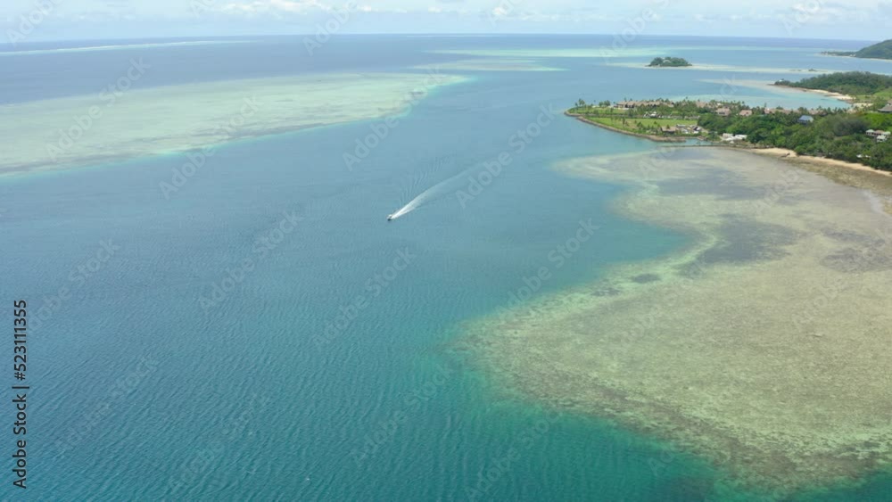 Aerial Panning Beautiful View Of Speedboat Moving On Sea By Green Landscape - Suva, Fiji Aerial Panning Beautiful View Of Speedboat Moving On Sea By Green Landscape - Suva, Fiji