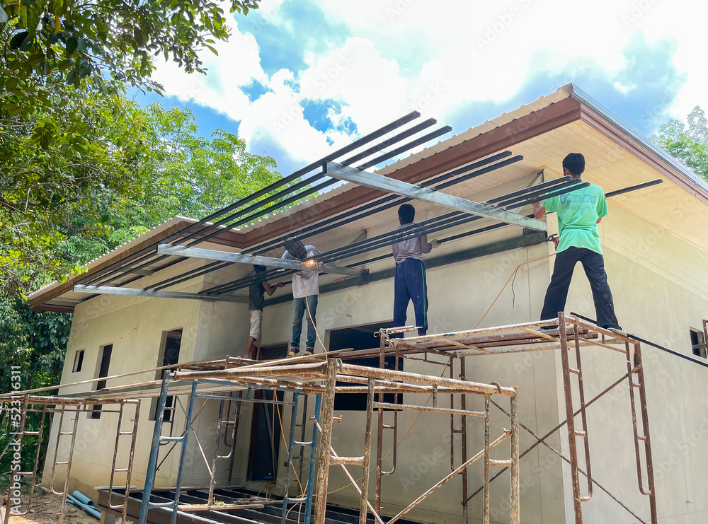 Construction worker , working for new house Construction worker , working for new house