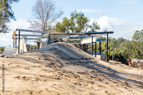 Wallpaper Mural Photograph of a severely flood damaged building on the banks of the Hawkesbury river Torontodigital.ca