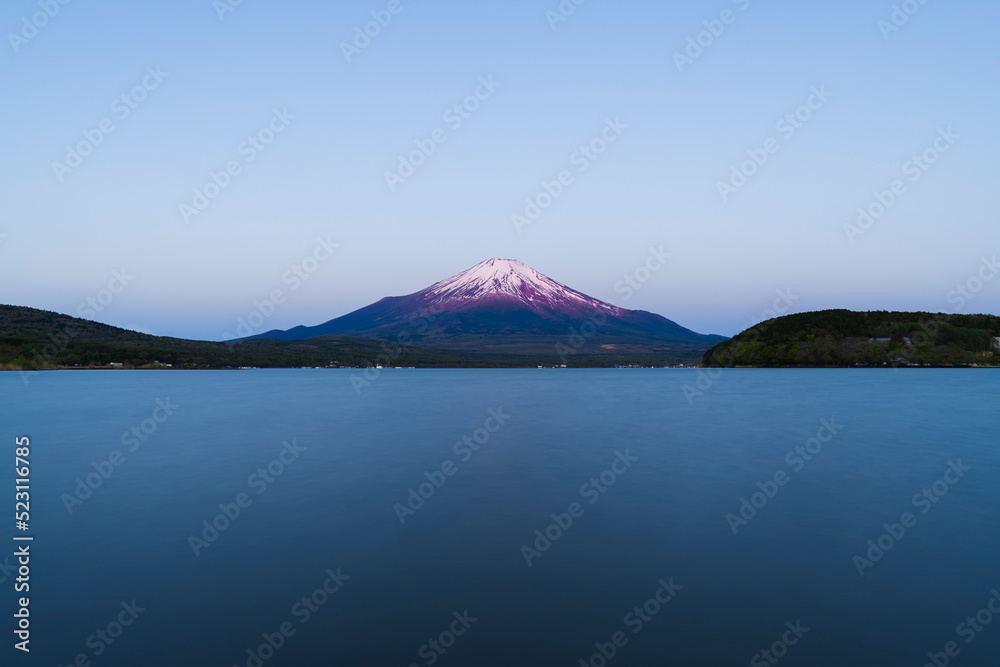 View of Mount Fuji at sunrise from lake Yamanaka, Yamanashi Prefecture, Japan