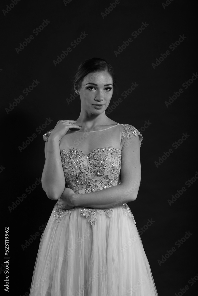 Fototapeta premium Portrait of woman in vintage dress in black and white