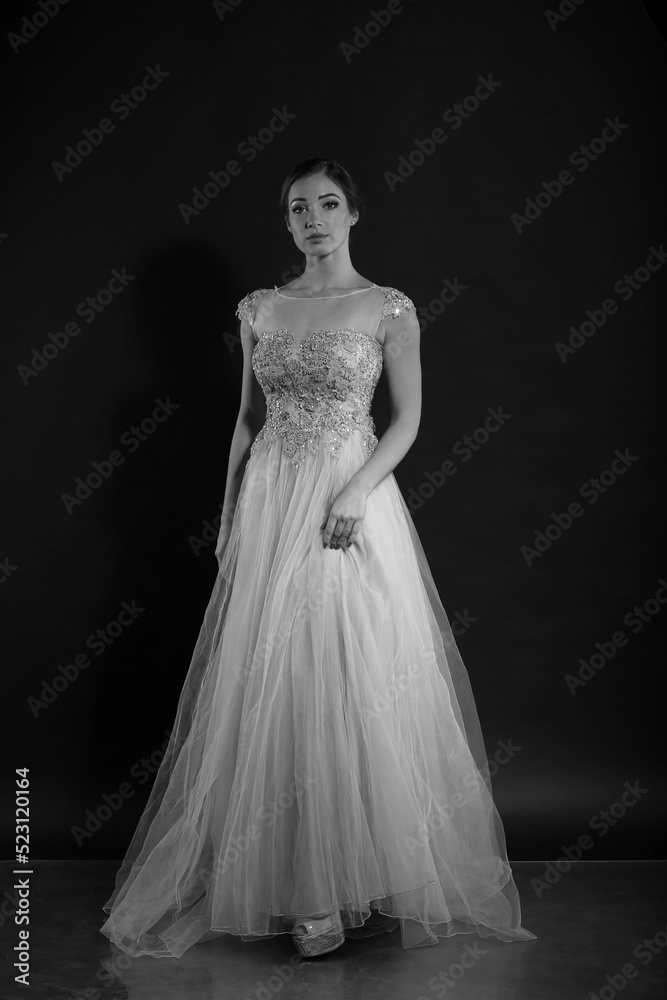 Fototapeta premium Portrait of woman in vintage dress in black and white