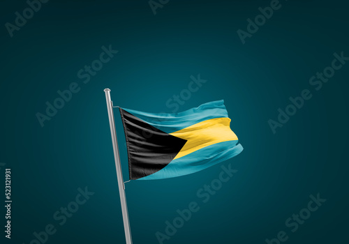 Bahamas flag waving in the wind on flagpole.