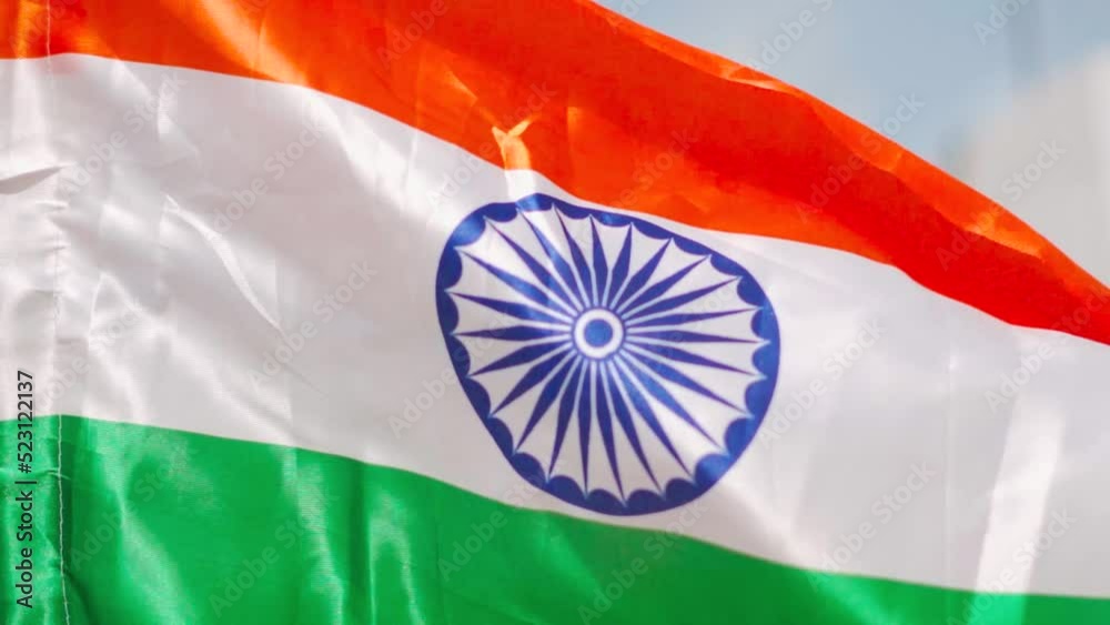Close up slow motion shot of India flag waving in wind. 15th August. Indian tri color flag background. Indian national flag. Independence day concept