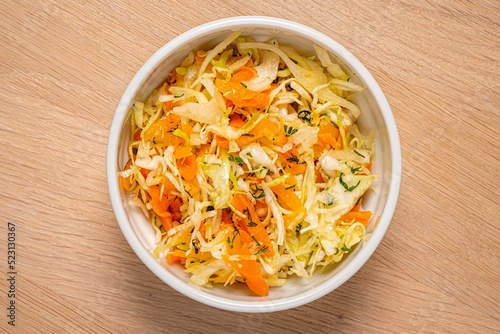 cabbage salad on the wooden background