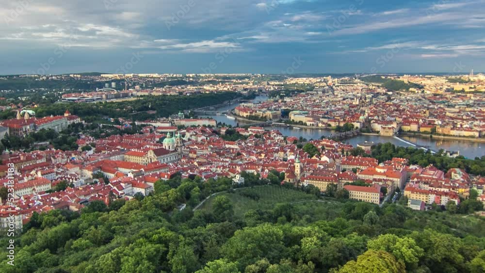 Wonderful timelapse View To The City Of Prague From Petrin Observation Tower In Czech Republic. Blue cloudy sky before sunset Wonderful timelapse View To The City Of Prague From Petrin Observation Tower In Czech Republic. Blue cloudy sky before sunset