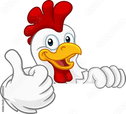 Fotografija A chicken rooster cockerel bird cartoon character peeking over a sign and giving