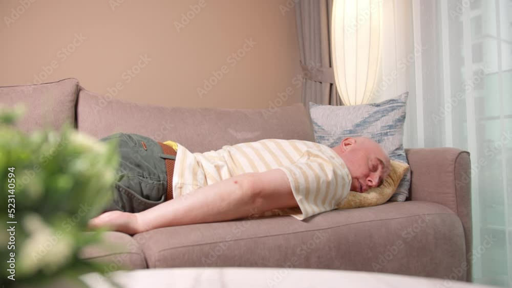 Exhausted or Bored Young Sleepy Man Falls down on Sofa. Funny girl lying asleep feeling lack of motivation, fatigue or depression concept. Apathetic tired lazy lady sleeping on couch at home alone. Exhausted or Bored Young Sleepy Man Falls down on Sofa. Funny girl lying asleep feeling lack of motivation, fatigue or depression concept. Apathetic tired lazy lady sleeping on couch at home alone.