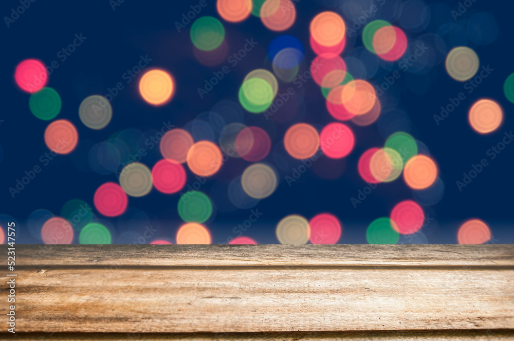 christmas lights on the wooden background