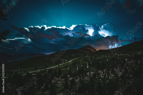 Nightly thunderstorm passes in the Dolomites photo