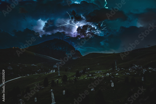 Huge lightning bolt during nightly thunderstorm in the Dolomites