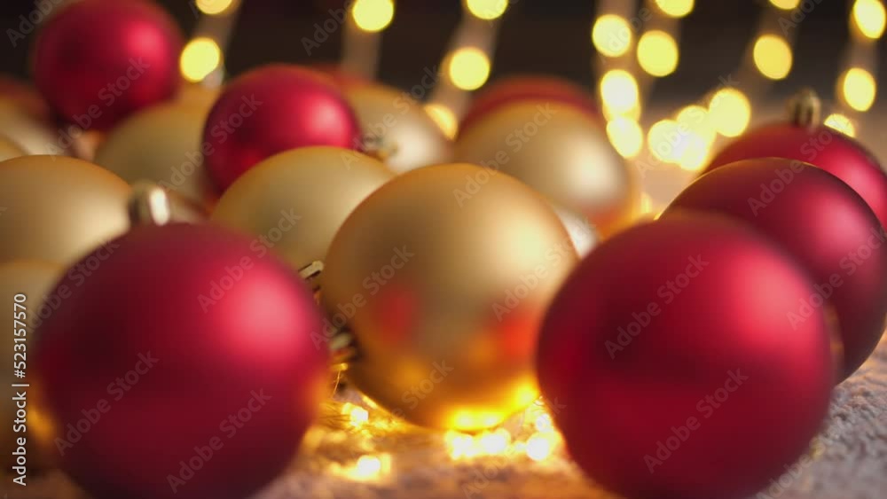 Christmas balls background. Christmas decorations close-up. Red and gold Christmas tree balls. New Year's decor for festive winter atmosphere of home comfort. Season winter rest, holiday. Abstraction. Christmas balls background. Christmas decorations close-up. Red and gold Christmas tree balls. New Year's decor for festive winter atmosphere of home comfort. Season winter rest, holiday. Abstraction.