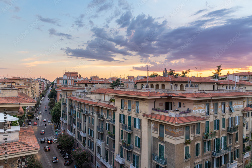 Sunset over Rome, Italy from the roof of a residential apartment building