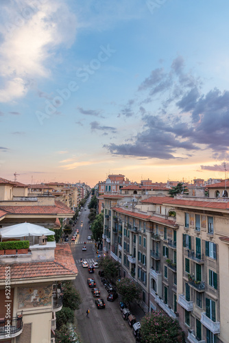 Sunset over Rome, Italy from the roof of a residential apartment building © HumbleBee