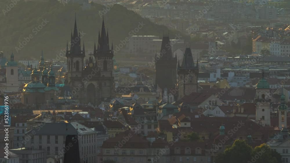 Spires of the old town and tyn church during sunrise timelapse. czech republic, prague. View from Strahov Monastery at dawn Spires of the old town and tyn church during sunrise timelapse. czech republic, prague. View from Strahov Monastery at dawn