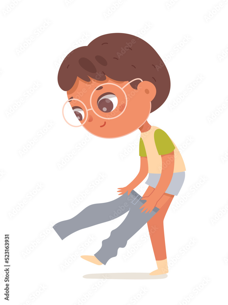 Cute boy putting on jeans, kid with glasses holding jeans to put on before school lessons