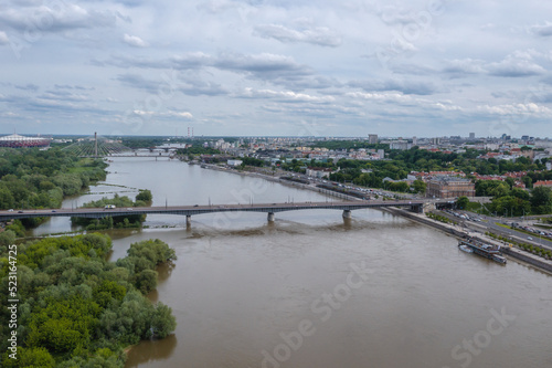 Drone view of Slasko-Dabrowski Bridge over Vistula River in Warsaw city, Poland