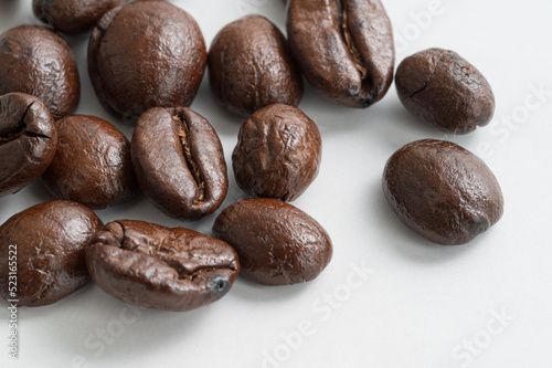 Coffee beans macro close-up, white background