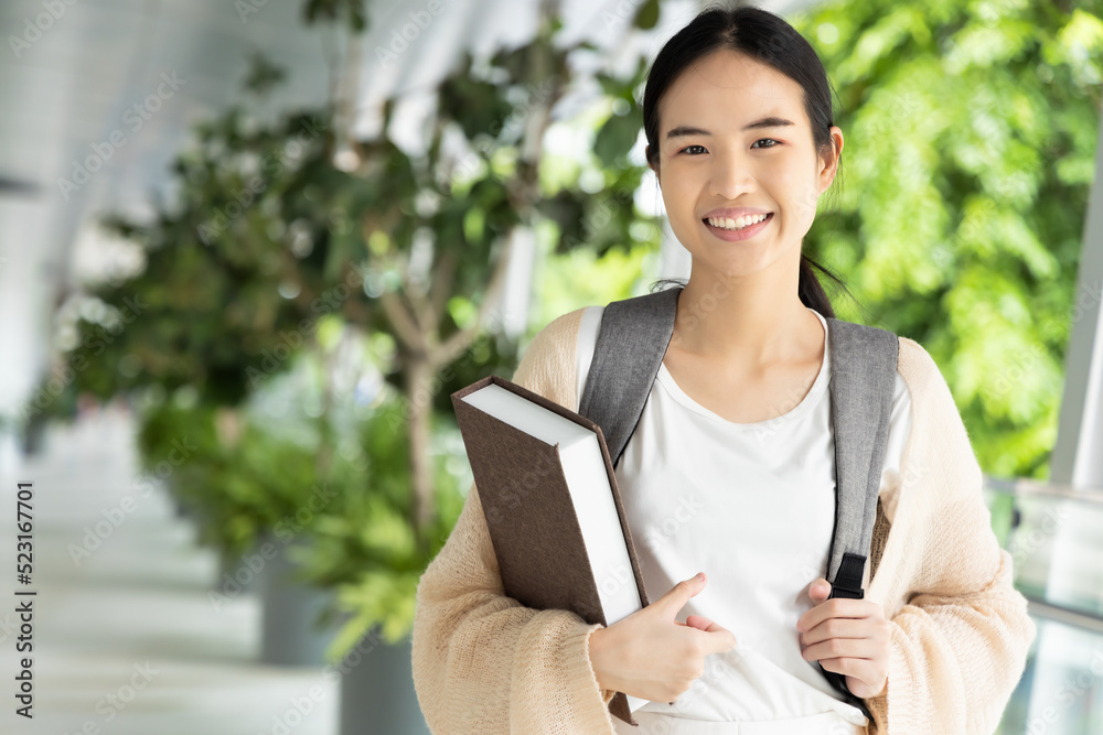 Smart and confident asian woman college student getting back to school Smart and confident asian woman college student getting back to school